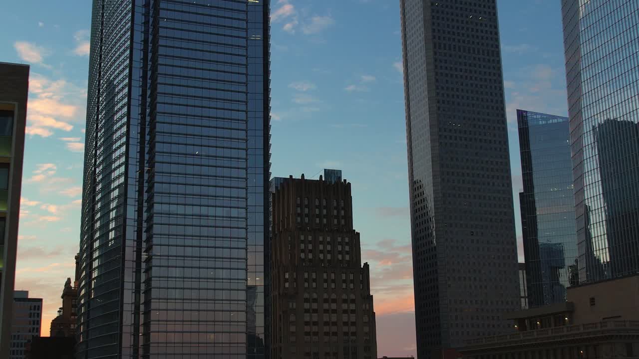 Aerial - Skyscrapers in Houston with reflections at dusk
