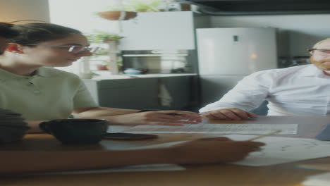 couple discussing family budget with financial planner