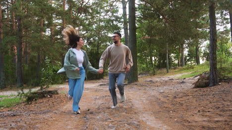 couple running in the forest