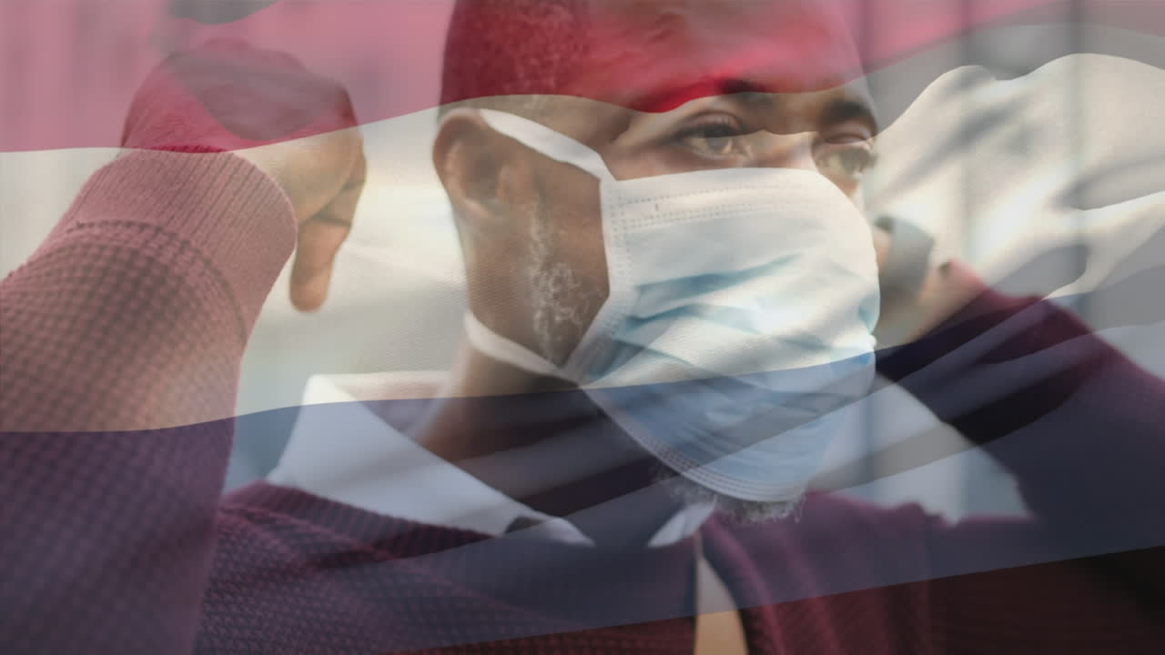 길거리에서 얼굴 마스크를 쓰고 있는 아프리카계 미국인 남자가 네덜란드 발을 흔들고 있는 애니메이션