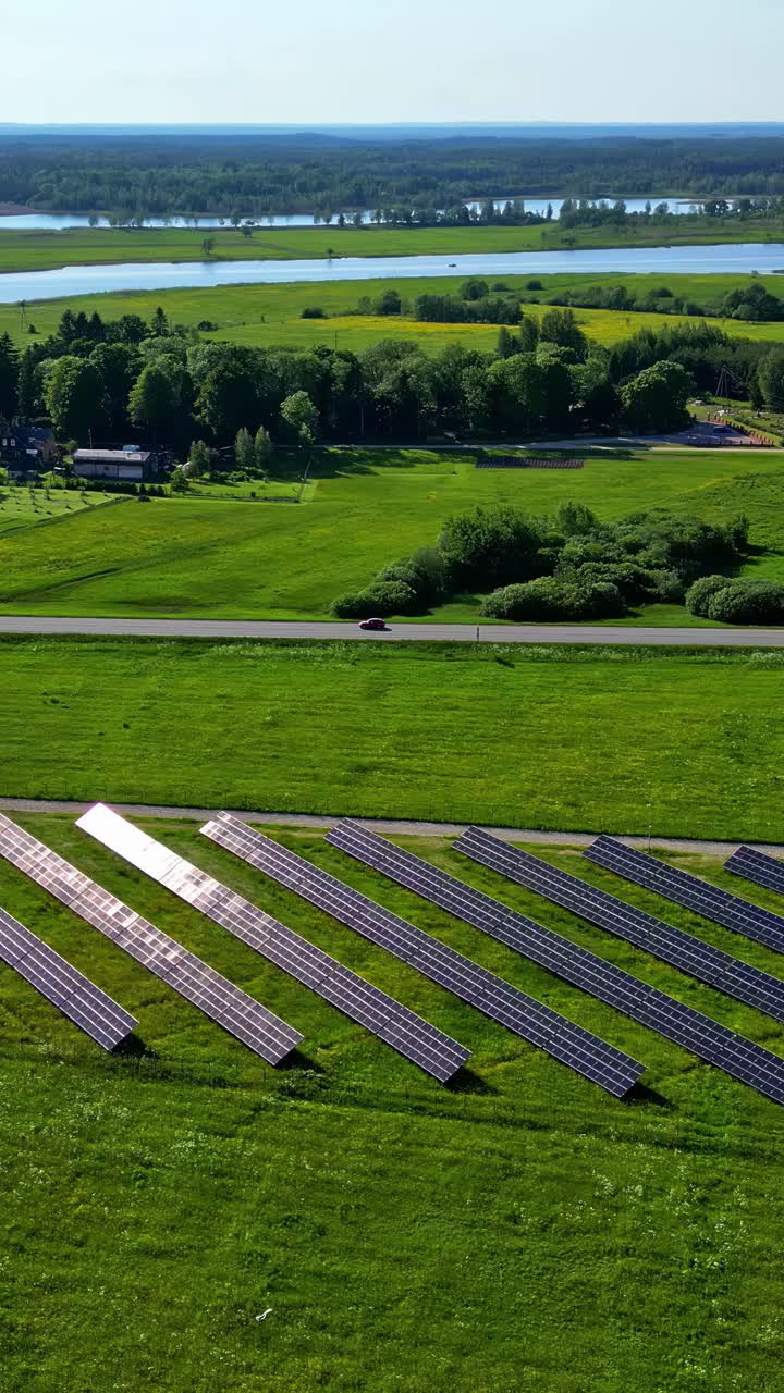 Solar Panels In A Rural Field - Vertical Shot