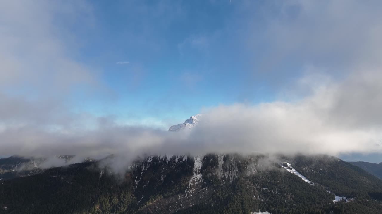 Timelapse of misty lonely mountain with snow summit, Chamchaude, French Alps