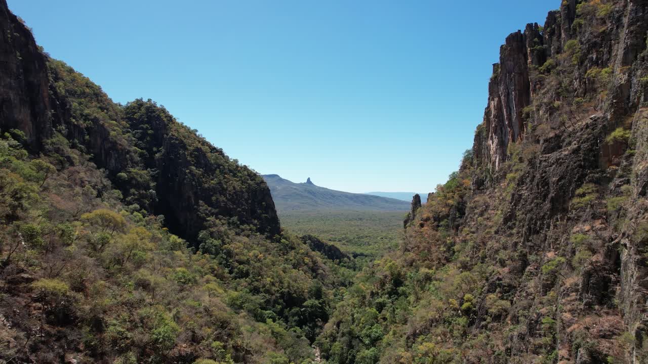 canyons and valley Guardian waterfall, Vao do Moleque community in Chapada dos Veadeiros, blue water, sunny day, incredible landscape
