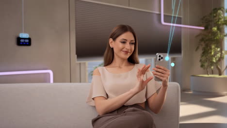a woman interacts with her smartphone in a modern smart home setting