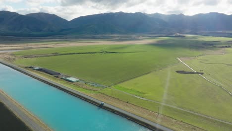 Stunning-panoramic-aerial-view-of-Lord-of-the-Rings-shooting-location-for-Pelennor-Fields-in-Mackenzie-District,-South-Island-of-New-Zealand-Aotearoa