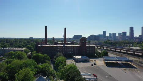 factory with chimney in suburb district of atlanta city at sunlight