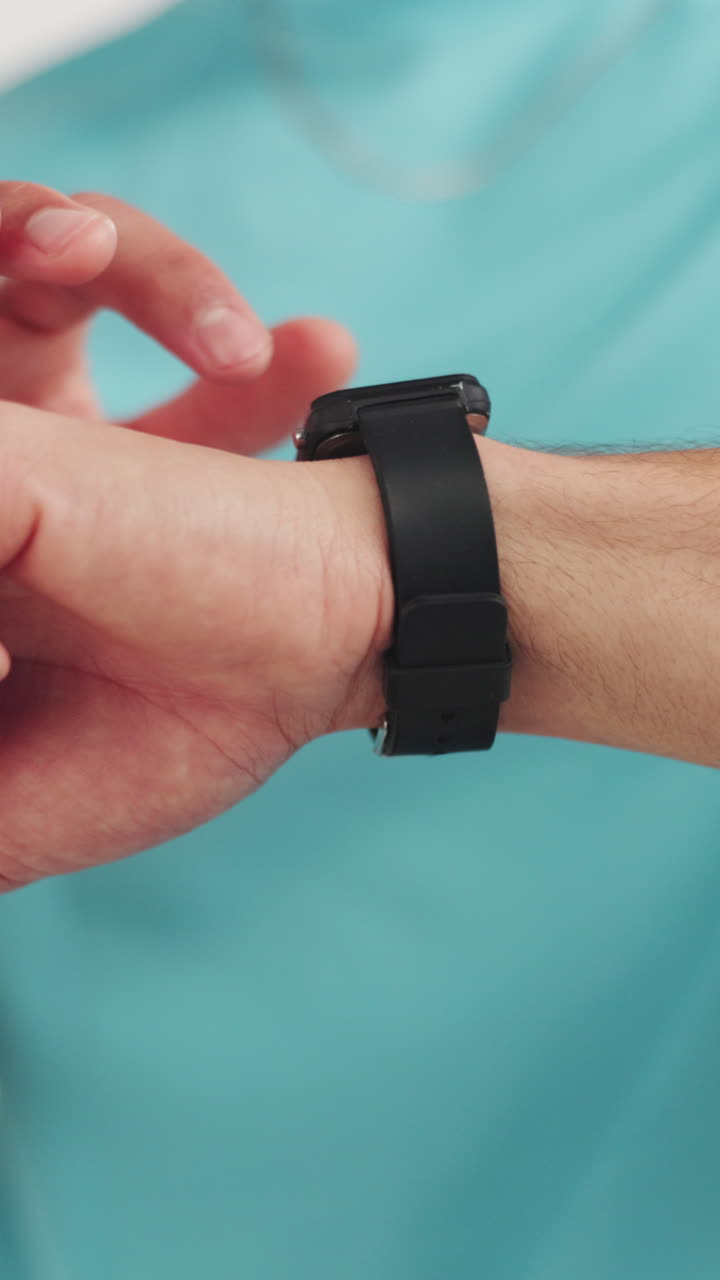 Close-up of Hand Tapping and Swiping Smartwatch Screen