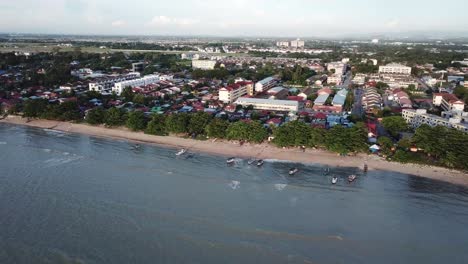 aerial view boats parking at seaside bagan ajam, pantai bersih.