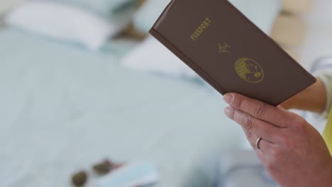 hands of asian woman holding documents, preparing for travel