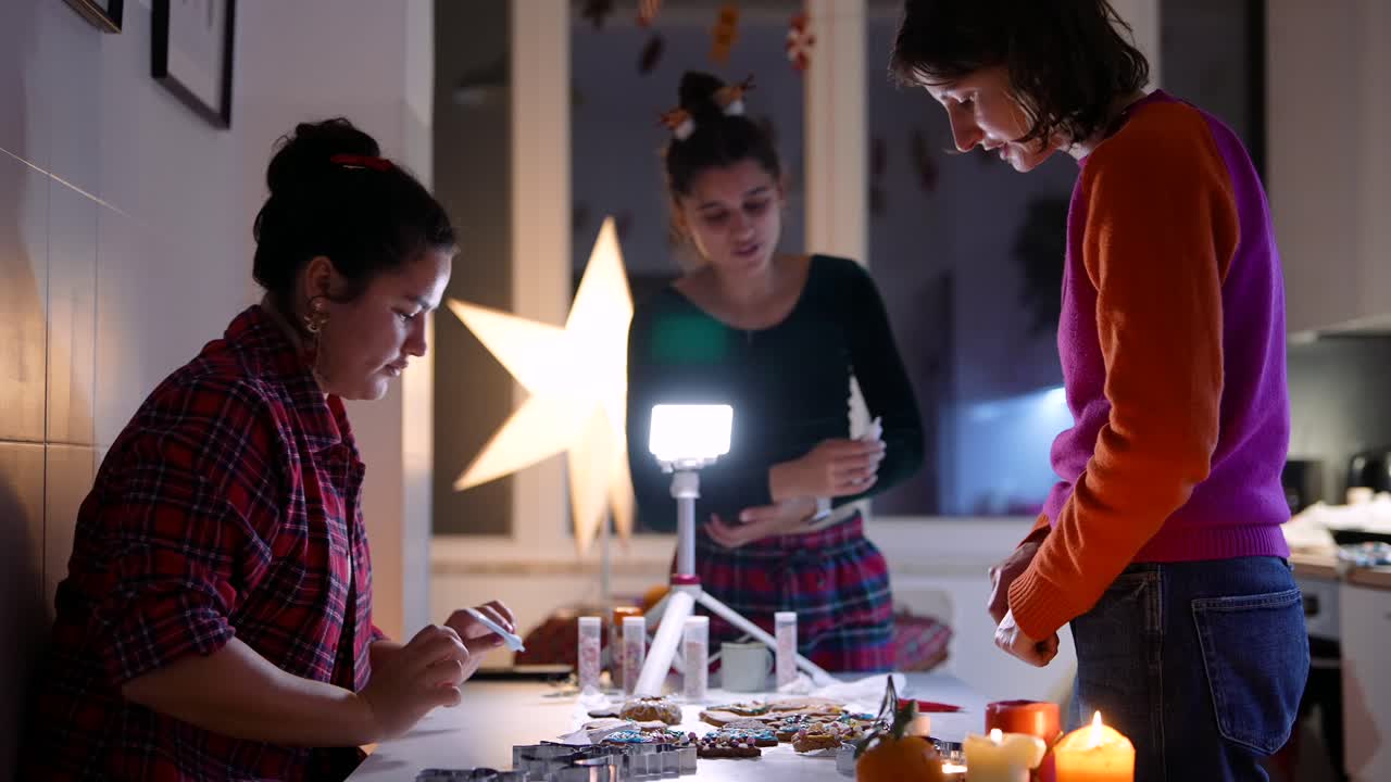 Women Decorating Cookies for Christmas