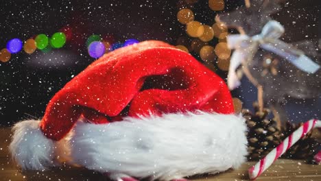 Falling-snow-with-Christmas-hat-and-decorations