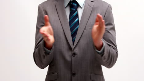 Businessman-clapping-on-white-background