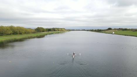 the national water sports centre holme pierrepont, nottinghamshire england uk aerial view of single scull in training