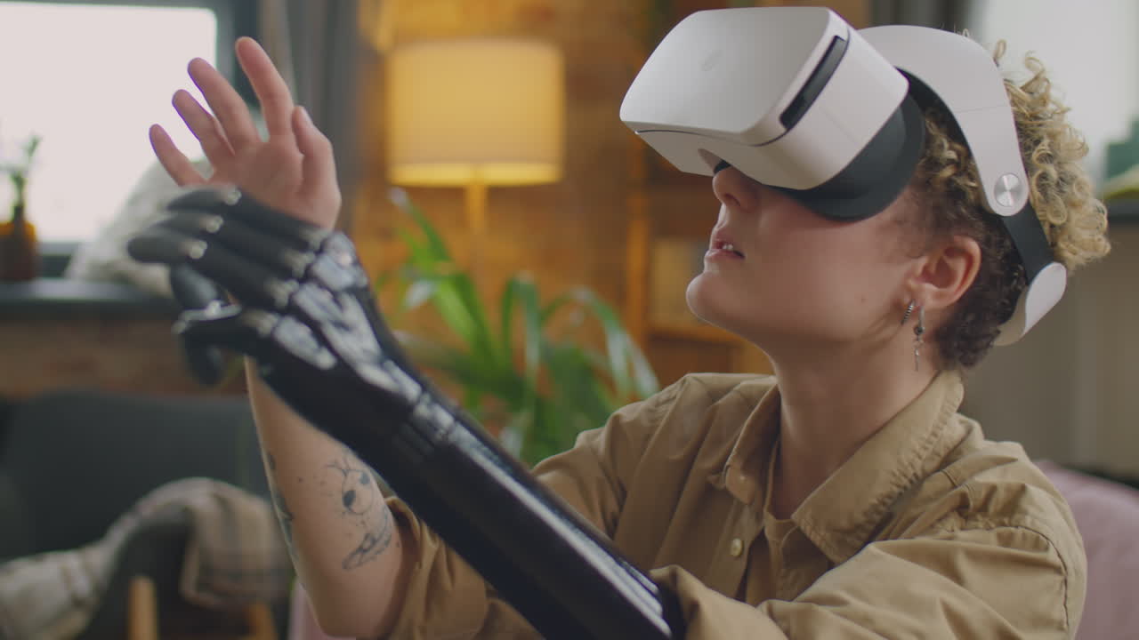 Girl with Prosthetic Arm Playing Game with VR Headset