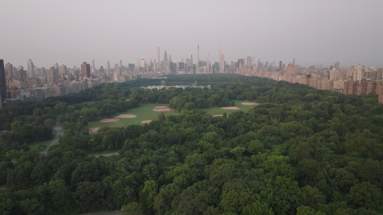 Aerial view of Central Park on a summer morning. Shot at sunrise in New York City