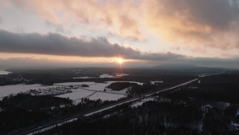 dusk clouds over winterly countryside in orford, quebec canada