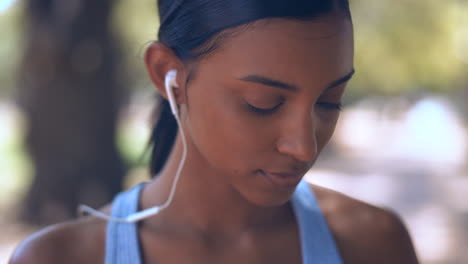 Music,-earphones-and-woman-outdoor-for-fitness