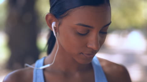 music, earphones and woman outdoor for fitness