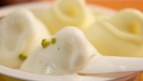 close-up of pistachio ice cream in a cup