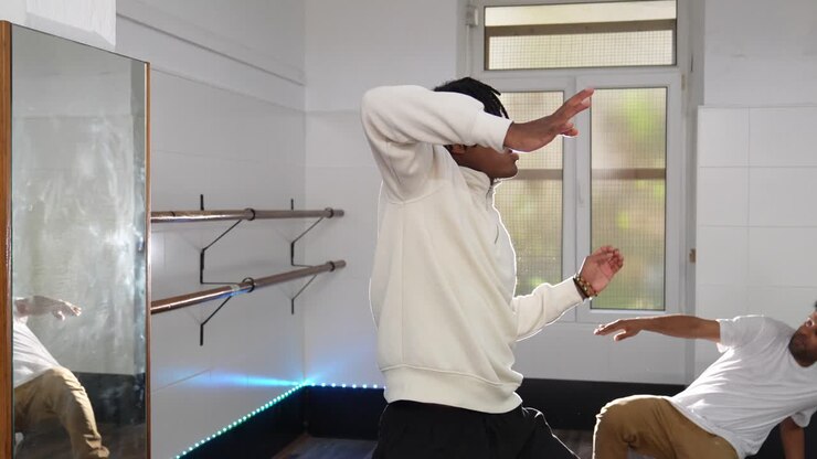 Two men dancing in a dance studio