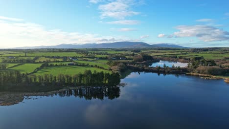 Peaceful-scene-from-Ballysunnock-over-the-lush-green-farmland-of-Waterford-to-the-Comeragh-Mountain-range