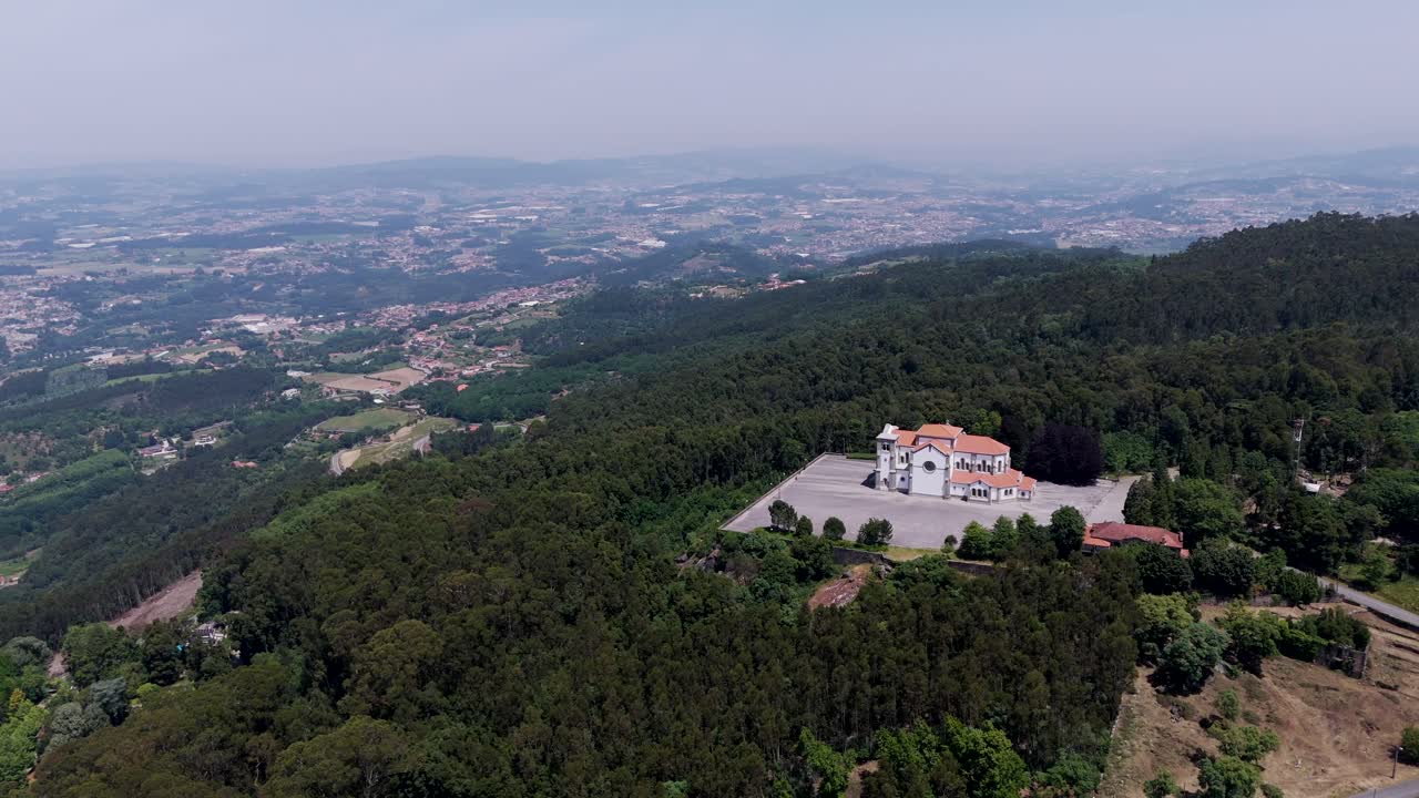 Stunning aerial view of Santuário da Assunção in lush hills