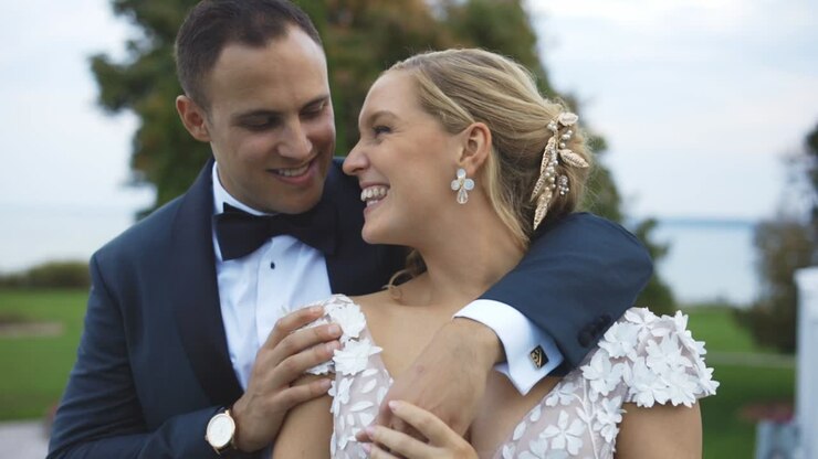 Bride and groom cuddling at luxury hotel