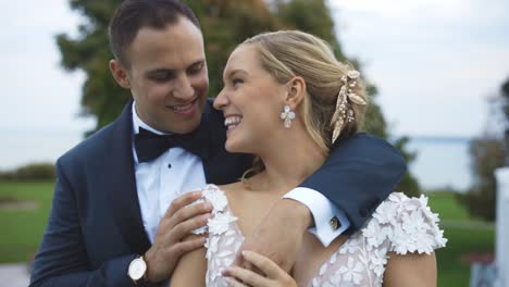 bride and groom cuddling at luxury hotel