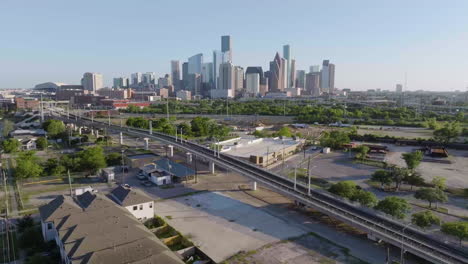 aerial view of the metrorail and the downtown skyline, golden hour in houston