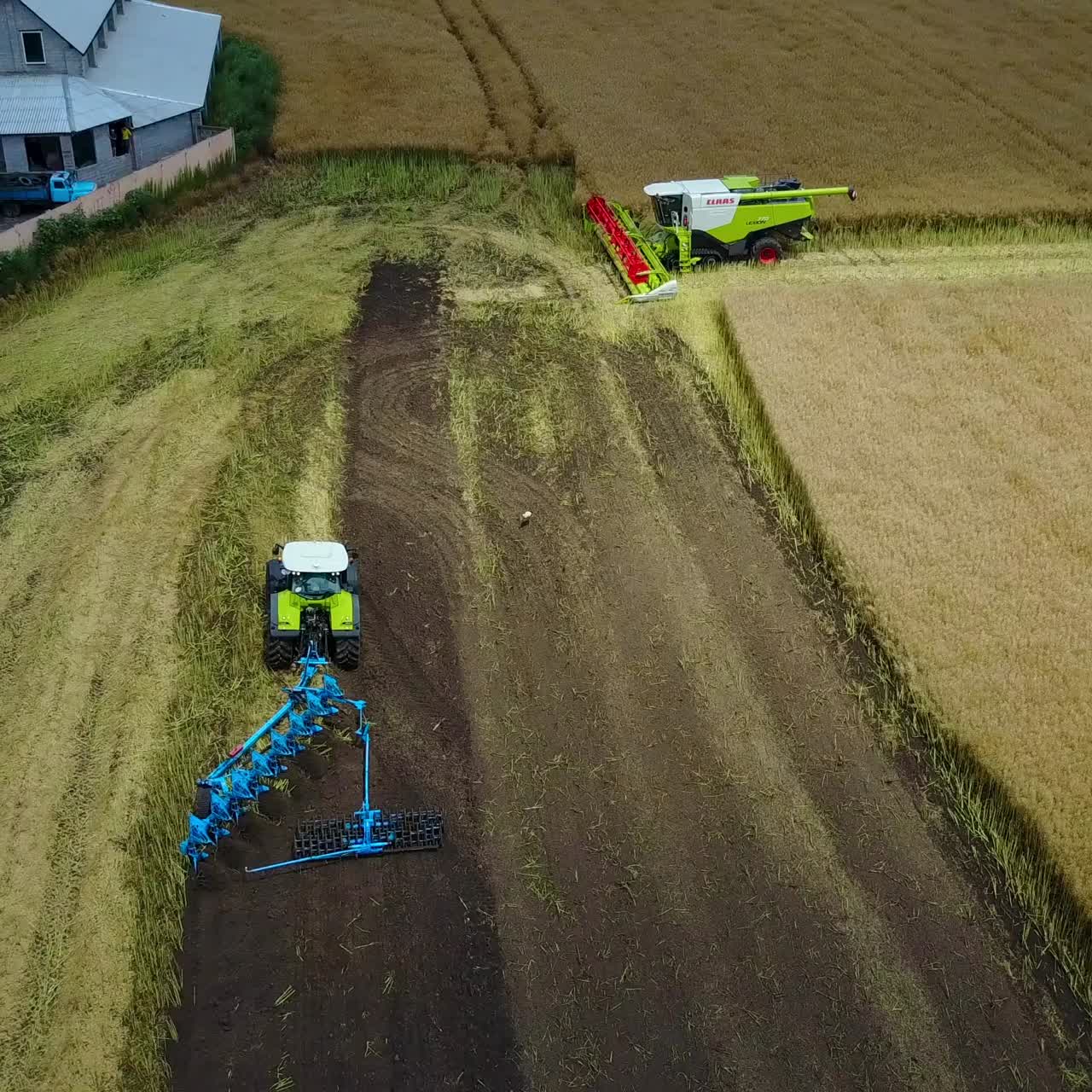 Tractor Plows The Field