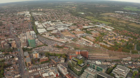 wide rising aerial shot of watford train station