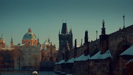 charles bridge as seeing from the vltava river sunlight