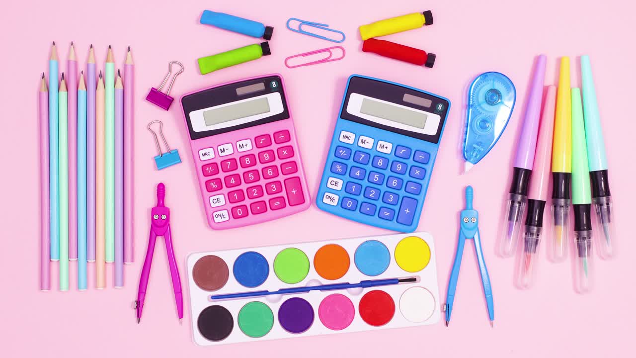 Creative pastel back to school layout made of moving vibrant school accessories on pastel pink theme. Stop motion