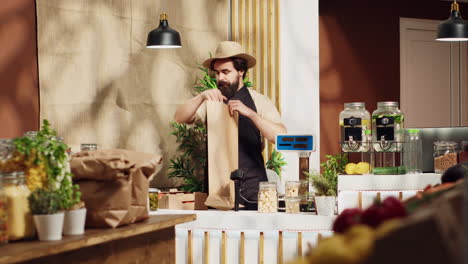 Store-vendor-prepares-client-groceries