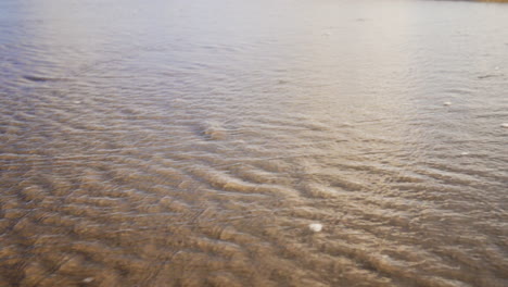 wrinkles in the sand after a wave