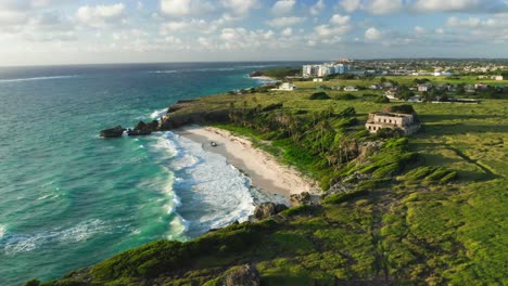 static aerial of bathsheba picturesque ocean and landscape