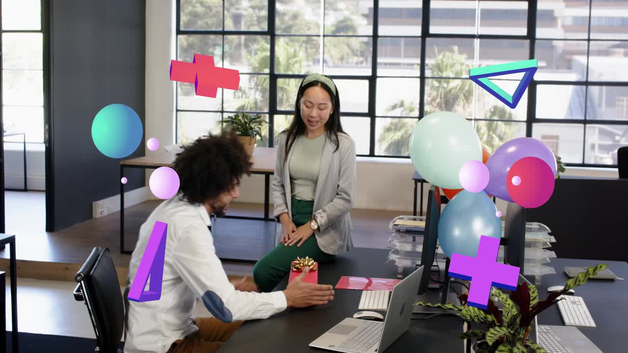 Woman placing gift on desk, man standing hugging checking box, balloons floating over office