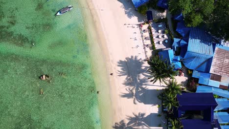 Tropical-island-bay-palm-beach,-turquoise-clear-water