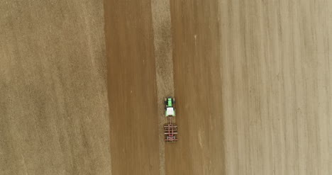 agriculture tractor plowing gmo free agricultural field 4k