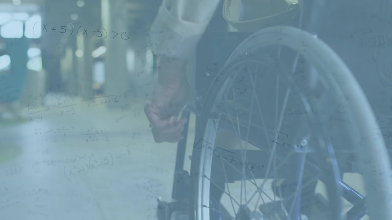 휠체어에 앉은 남성 위로 펼쳐지는 수학 공식 애니메이션