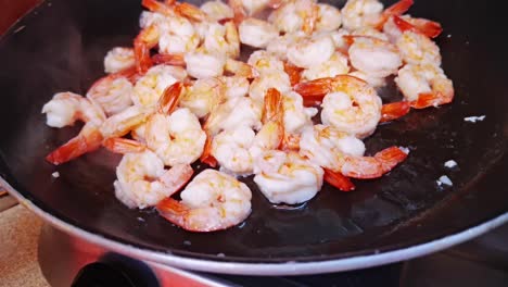 closeup of shrimp cooking on a grill in 4k