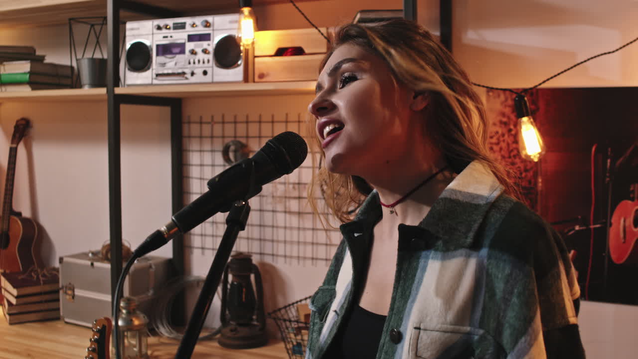 Attractive Rock Girl Singing In Microphone