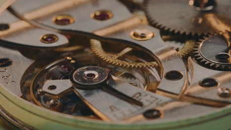 close-up of gear mechanism of a vintage watch - macro shot