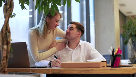 coworkers talking in the office