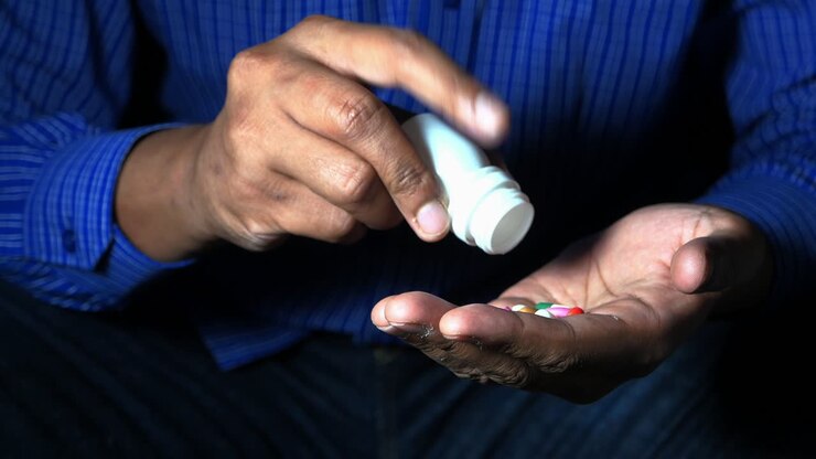 Person taking pills