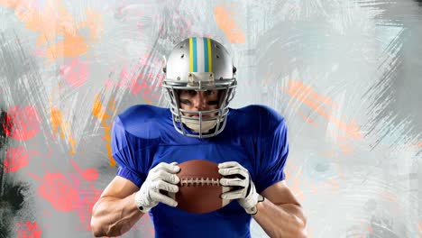 Animation-of-american-football-player-holding-ball-on-abstract-grey-and-pink-painted-background