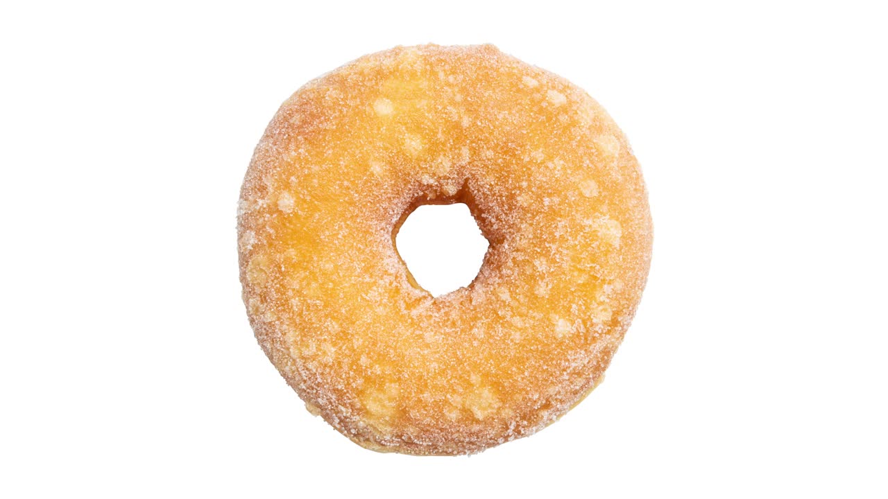 vista superior de las rosquillas de azúcar girando sobre un fondo blanco