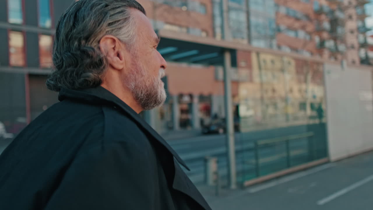 Stylish Man in City Observes the Streetscape