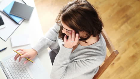 young student working at home