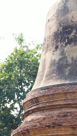 camera zooms in on an ancient brick pagoda